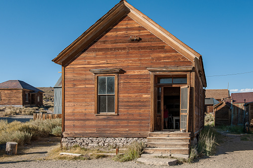 Bodie Ghost Town in Mono County, California became a boom town during the gold rush in 1876. It was described as a ghost town in 1915.
