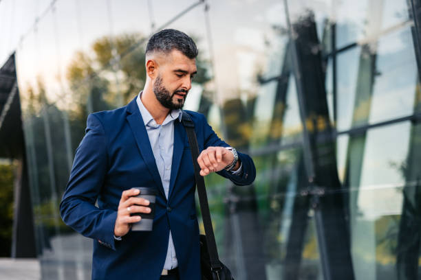 istock Mid-Adult Businessman Running Late For Work 2122136754