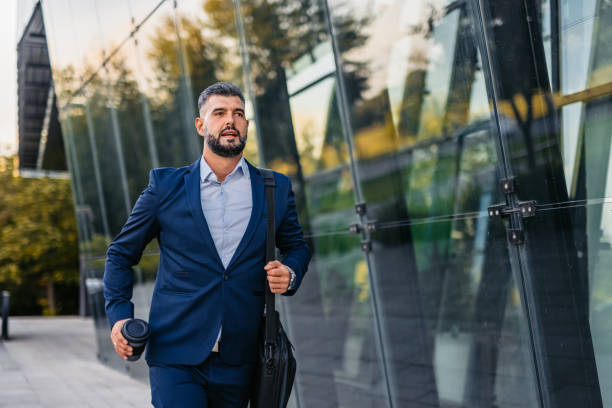 Mid-Adult Businessman Running Late For Work