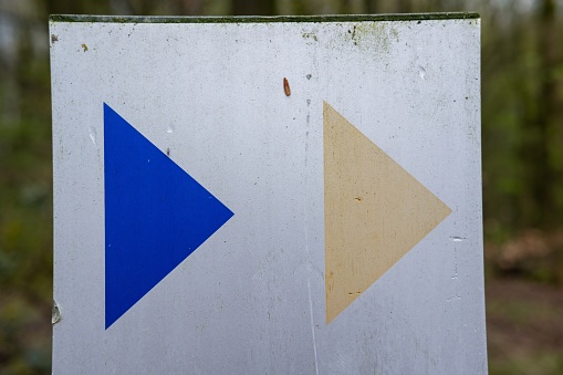 directional arrows on metal plate