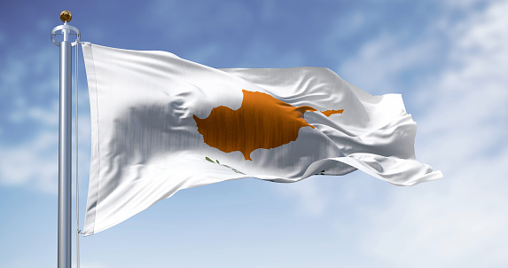 Cyprus national flag waving on a clear day. White flag with two olive branches under the dark orange map of the whole island. 3d illustration render. Fluttering fabric