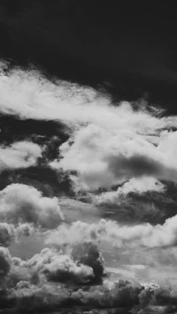 Cloudy Sky With Fluffy Clouds. Natural Background. , Time Lapse, Timelapse, Time-lapse. black anw white retro bw black white heavy Clouds Cloud Sky Moving In Sky. Background raging Cloudscape Time Lapse, Timelapse, Time-lapse. Background. Abstract Pink