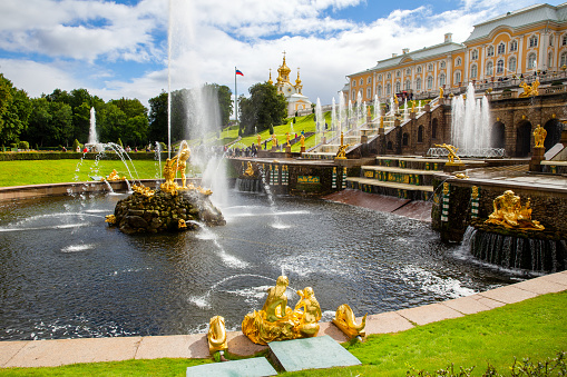 St. Petersburg, Russia - September 05, 2022: Grand Cascade and Grand Palace of the Palace and Park Ensemble in Peterhof, St. Petersburg, Russia