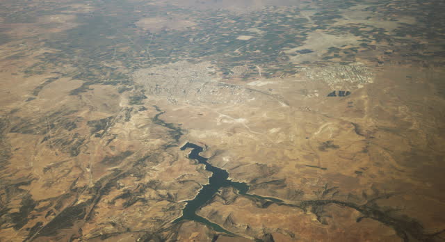View From Airplane Window On Karaman City And Godet Dam, Turkey. Karaman, Historically Known As Laranda City. Located In Central Anatolia. Aerial View From Airplane. Travel Concept