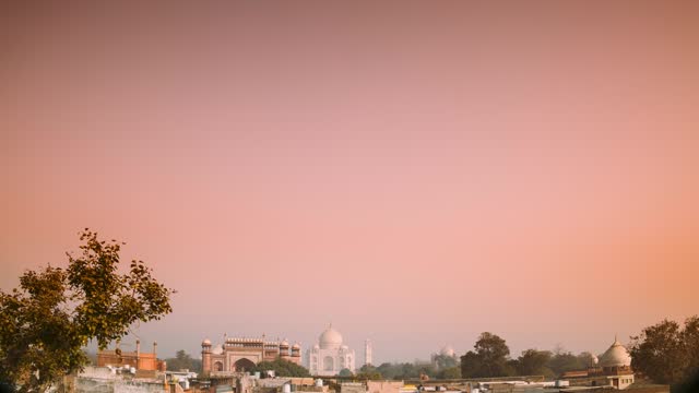 Taj Mahal in Agra, Uttar Pradesh, India. Seven 7 world wonders. Fabulous Taj mahal travel concept. indian islamic heritage at sunrise early morning time lapse time-lapse timelapse. nobody without people