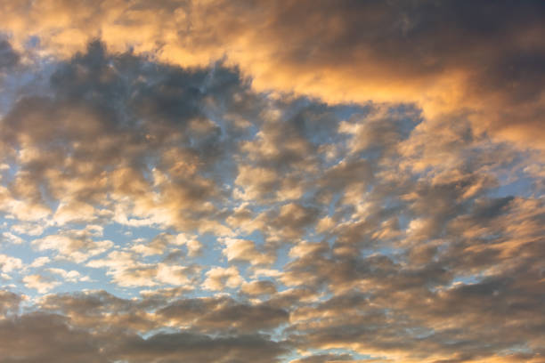 istock Colorful clouds at sunset as background 2122295926