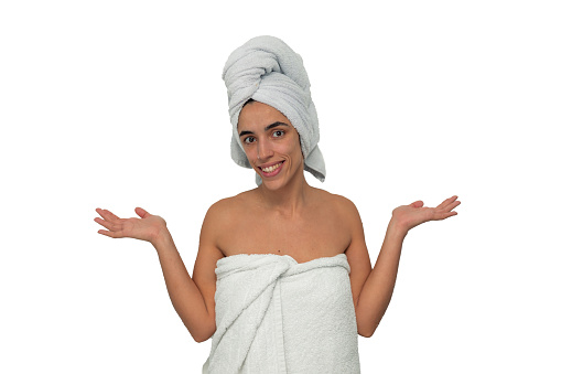 A smiling young woman, freshly out of the shower, is depicted with a towel wrapped around her chest and another on her head. Her hands are in gesture of contentment and relaxation on white background