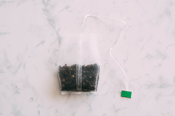Close Up of a Tea Bag. Oolong Tea with Pieces of Dried Fruits.