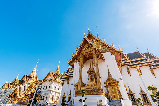 Dusit Maha Prasat hall at the Grand Palace complex in Bangkok in Thailand during the day.