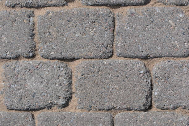 istock Restored gaps of paving slabs with sand 2122376451