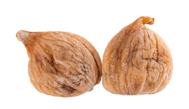 istock Dried figs fruit isolated on white background. Dried fruit snack. 2122400717