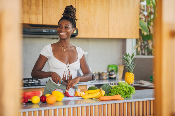 istock Healthy Start: Preparing Fresh Produce in a Modern Kitchen 2122405952