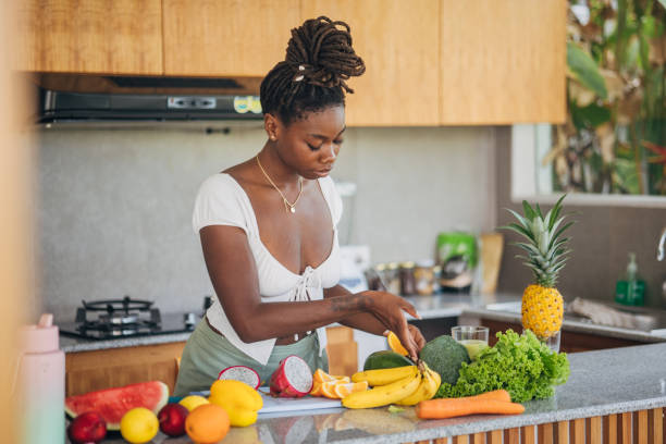 istock Healthy Start: Preparing Fresh Produce in a Modern Kitchen 2122406988