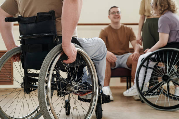 istock Dancers With Disabilities And Their Trainers During Break 2122427491