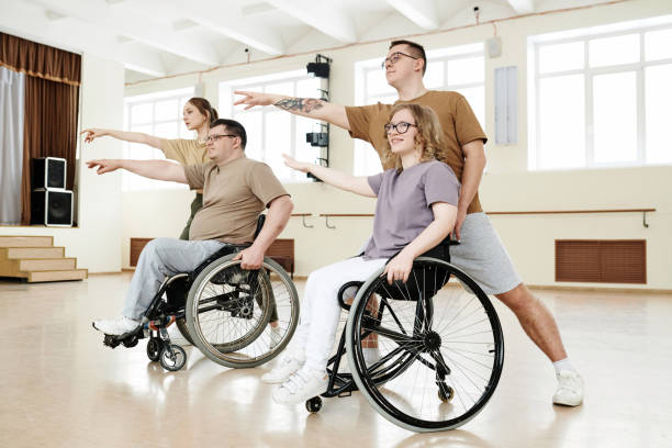 istock Men and Women Practicing Wheelchair Dance 2122428935