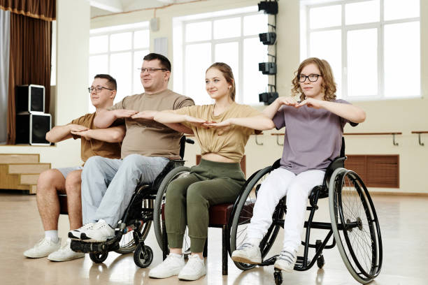 istock Coaches Working With Wheelchair Dancers 2122429581