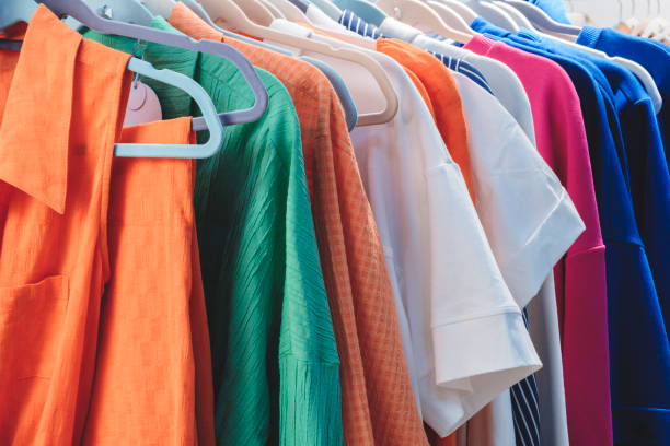 istock multicolor clothing in the store market 2122458653