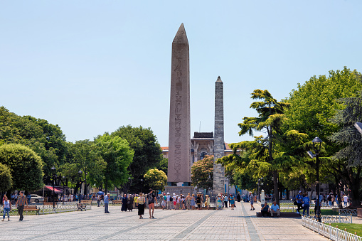 ISTANBUL, TURKEY - JULY 05, 2018: View of the Obelisk of Theodosius. Is the Egyptian obelisk of Pharaoh Thutmose III re-erected in the Hippodrome of Constantinople by the Roman emperor Theodosius I