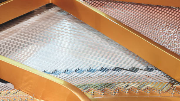 istock Interior of grand piano with strings 2122494404