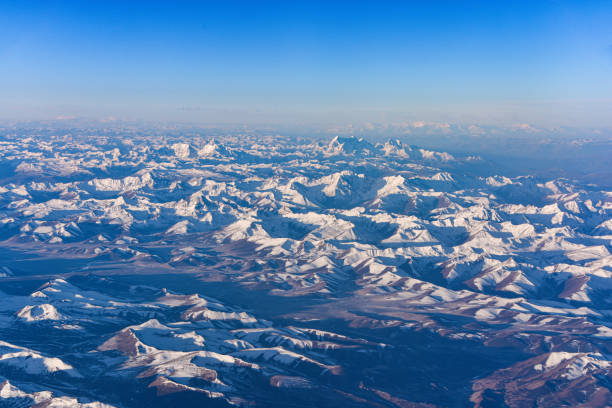 Aerial view of snow capped mountains in Sichuan and Tibet, China