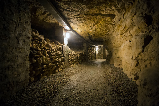 Underground passage in a mine or catacombs.