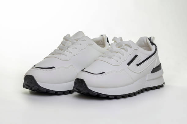 istock White sports sneakers on a white background 2122580063
