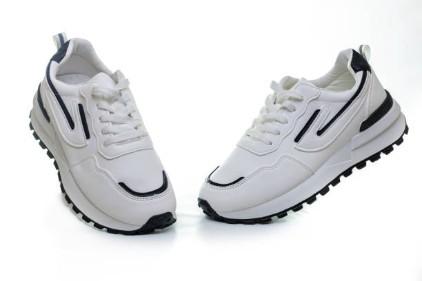 istock White sports sneakers on a white background 2122581098