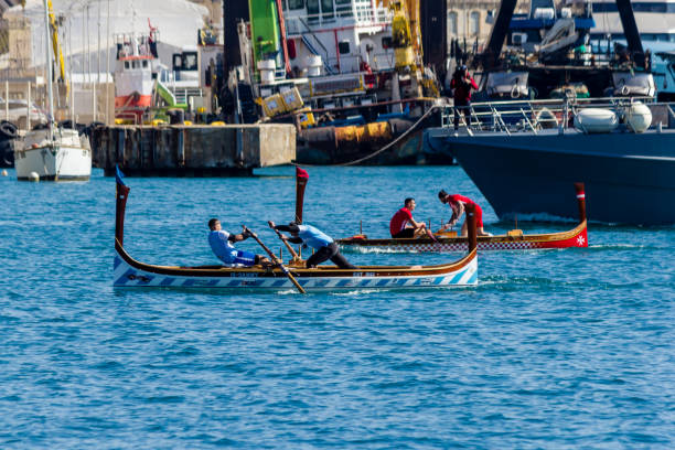 Foshan, China, June 14, -2013, Foshan Dragon Boat in a race on the river. June 14, 2013 is a traditional Chinese Dragon Boat Festival, the annual day, Foshan City, China will host dragon boat races to celebrate this festival.
