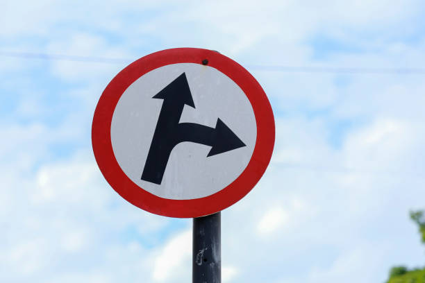 istock white traffic sign indicating two directions 2122603544