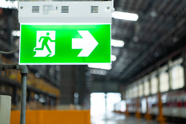 istock Emergency exit sign on the platform of the railway repair station. 2122611882