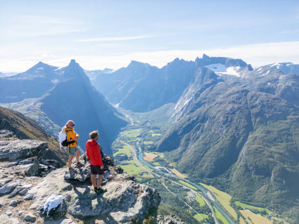 istock Two Young Hikers on Overlooking the Mountain Trail 2122657089