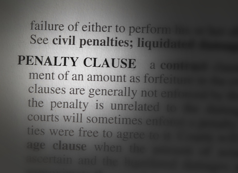 close up photo of the words penalty clause
