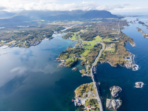istock Long, narrow road Connecting Small Grassy Islands 2122704920