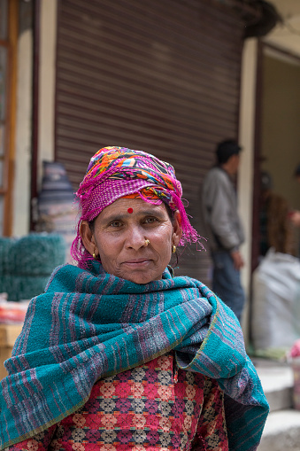 Leh, India - june 24, 2015 : Indian old woman on the street market in mountain village Leh, Ladakh region, north India, close up