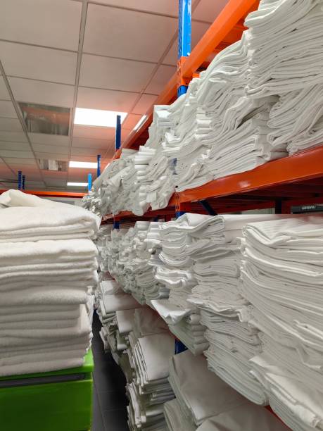 istock piles of blanket on laundry rooms. 2122723570