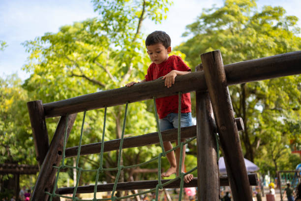 Boy using toys in public park