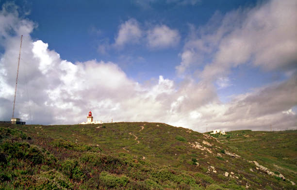 view of the high cliff and  lighthouse