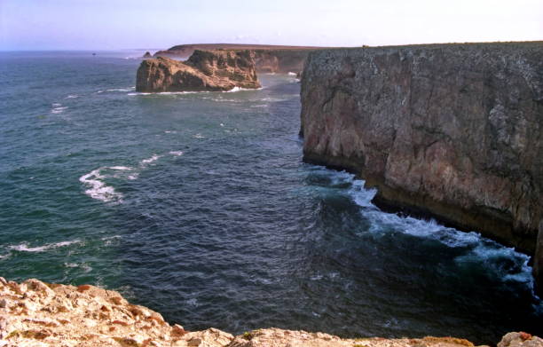 view of the ocean and high cliff