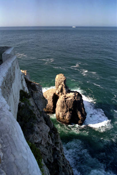view of the ocean and high cliff