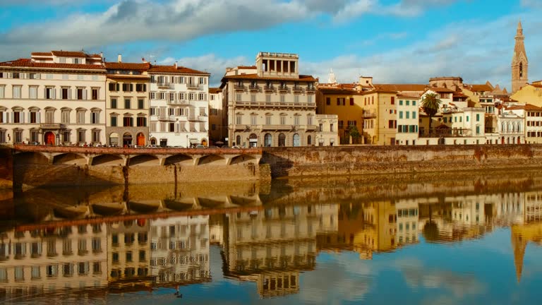 Florence by Sunset Reflected in Arno River, Tuscany, Italy