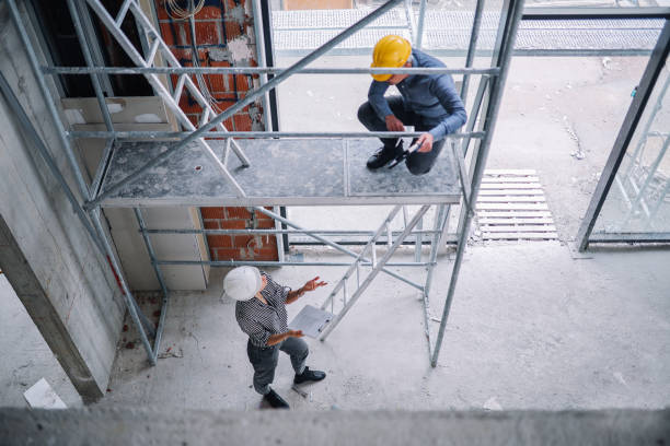 istock Overhead image of engineers at the construction site 2122883579