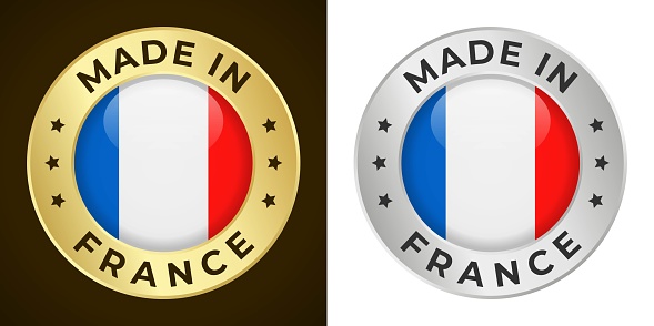 Made in France - Vector Graphics. Round Golden and Silver Label Badge Emblem Set with Flag of France and Text Made in France. Isolated on White and Dark Backgrounds