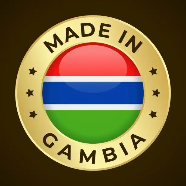 Vector illustration of Made in Gambia - Vector Graphics. Round Golden Label Badge Emblem with Flag of Gambia and Text Made in Gambia. Isolated on Dark Background