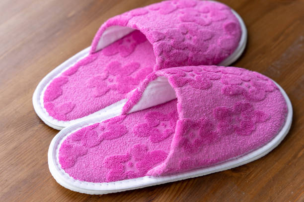 Pink color flip flops isolated on white background