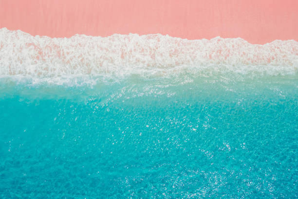 istock Pink sandy beach with blue ocean in Komodo national park 2122960671