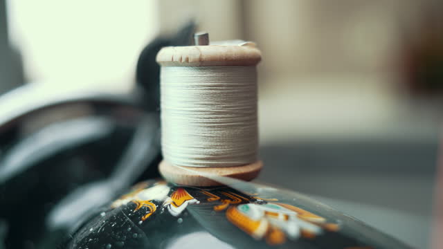 Spool of thread on sewing machine