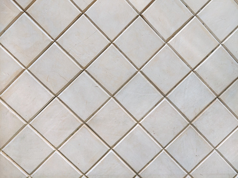 Seamless texture of diamond shape flat white stone slate, slate tiles, bright ivory white slate tiles for wall finishes.