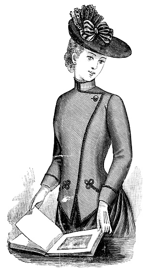 A 1890s Victorian style fashion, ladies redingote jacket with asymmetrical lapel. Vintage photo etching circa 19th century.