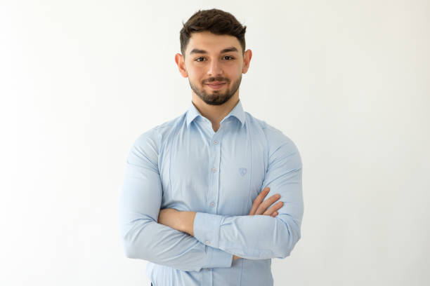 istock Man arms crossed and smiling at camera 2123039215