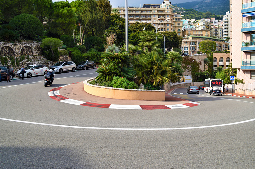 Monte Carlo, Monaco - October 4, 2009: The Grand Casino in Monte Carlo seen behind the famous hairpin turn of Virage Rascasse leading on to the uphill section of the Monaco Grand Prix route. Monaco has hosted the prestigious Formula One Monaco Grand Prix every year since 1929, with exception of 1938 - 1947.